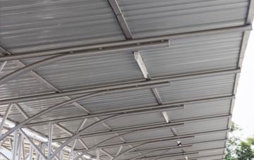 installing Holman Clavel metal roofing